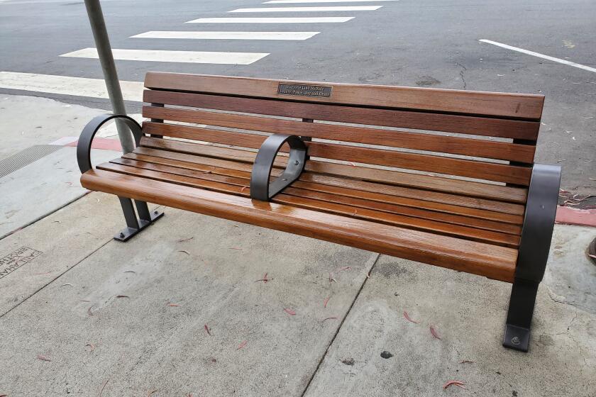 This refurbished memorial bench is at Girard Avenue and Wall Street in La Jolla.