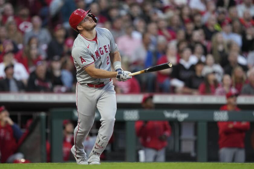 Los Angeles Angels' Mike Trout watches his pop flyout in the sixth inning of a baseball game against the Cincinnati Reds, Friday, April 19, 2024, in Cincinnati. (AP Photo/Carolyn Kaster)