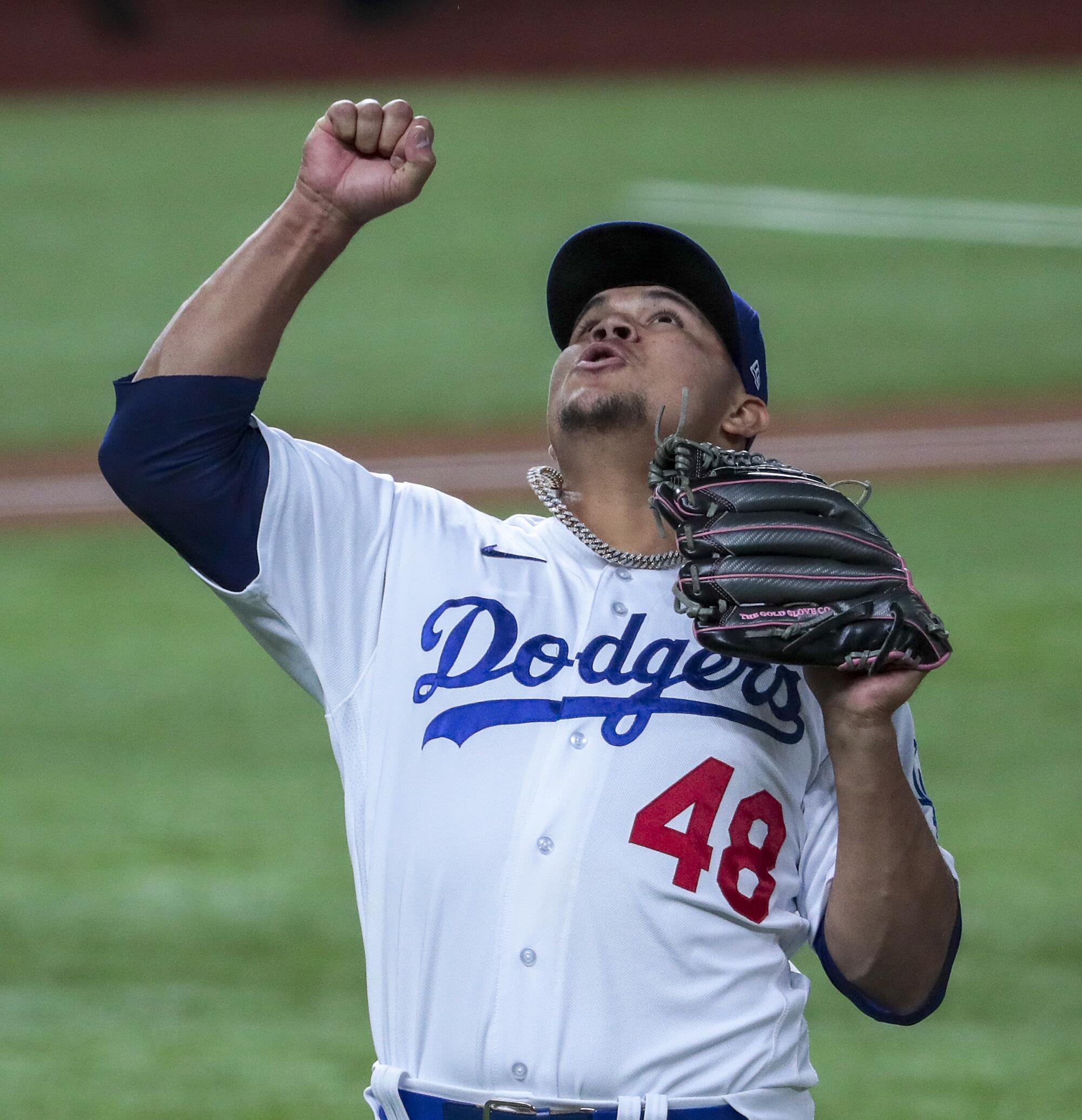 Dodgers reliever Brusdar Graterol celebrates after shutting out the Braves in the sixth inning of Game 1 of the NLCS.