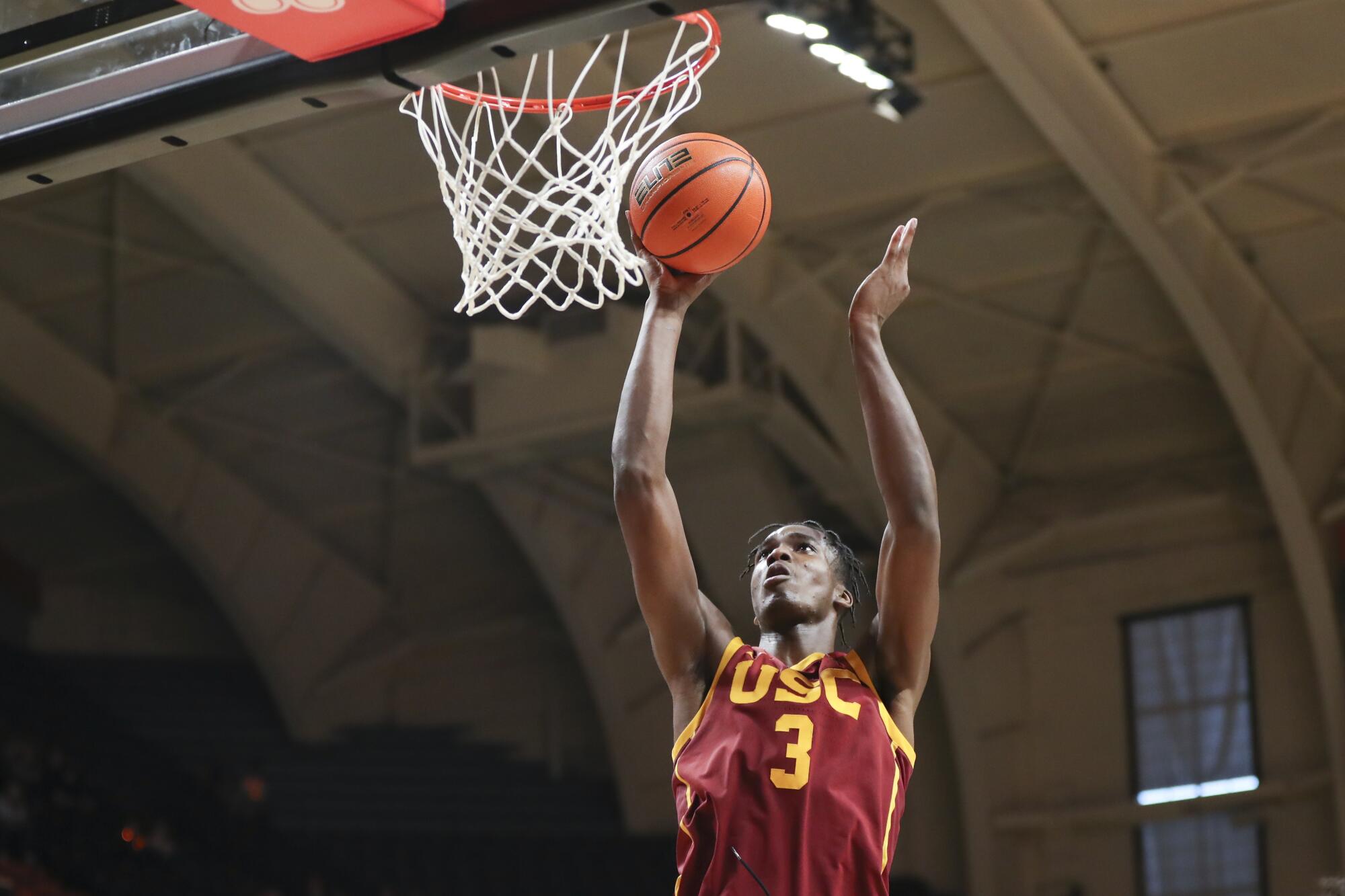 USC forward Vincent Iwuchukwu drives to the basket against Oregon State on Feb. 11