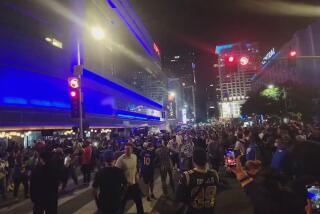 100s of Rams fans converged in downtown L.A., leading to police crack down