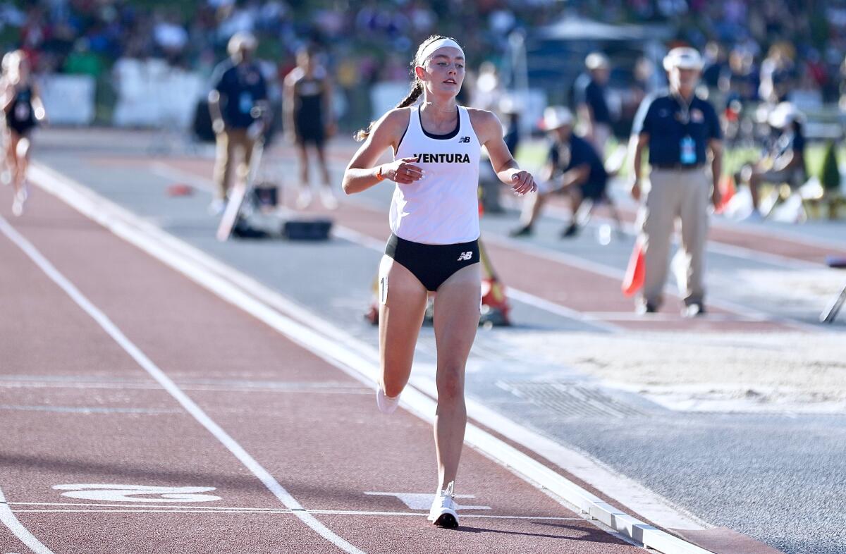 Ventura's Sadie Engelhardt crosses the finish line to win the girls' 1,600-meter title.