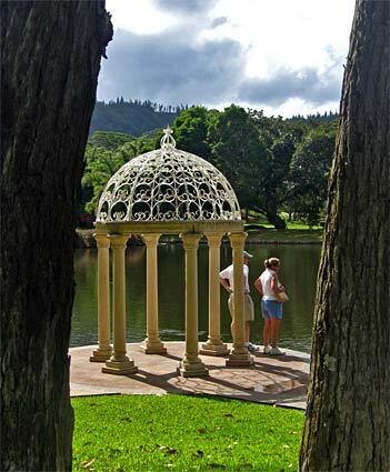 A lacy gazebo adds to the tranquillity of the gardens at the Lodge at Koele. Outdoor activities are popular with guests at the resort, which has the feel of an upscale hunting lodge in the tropics.