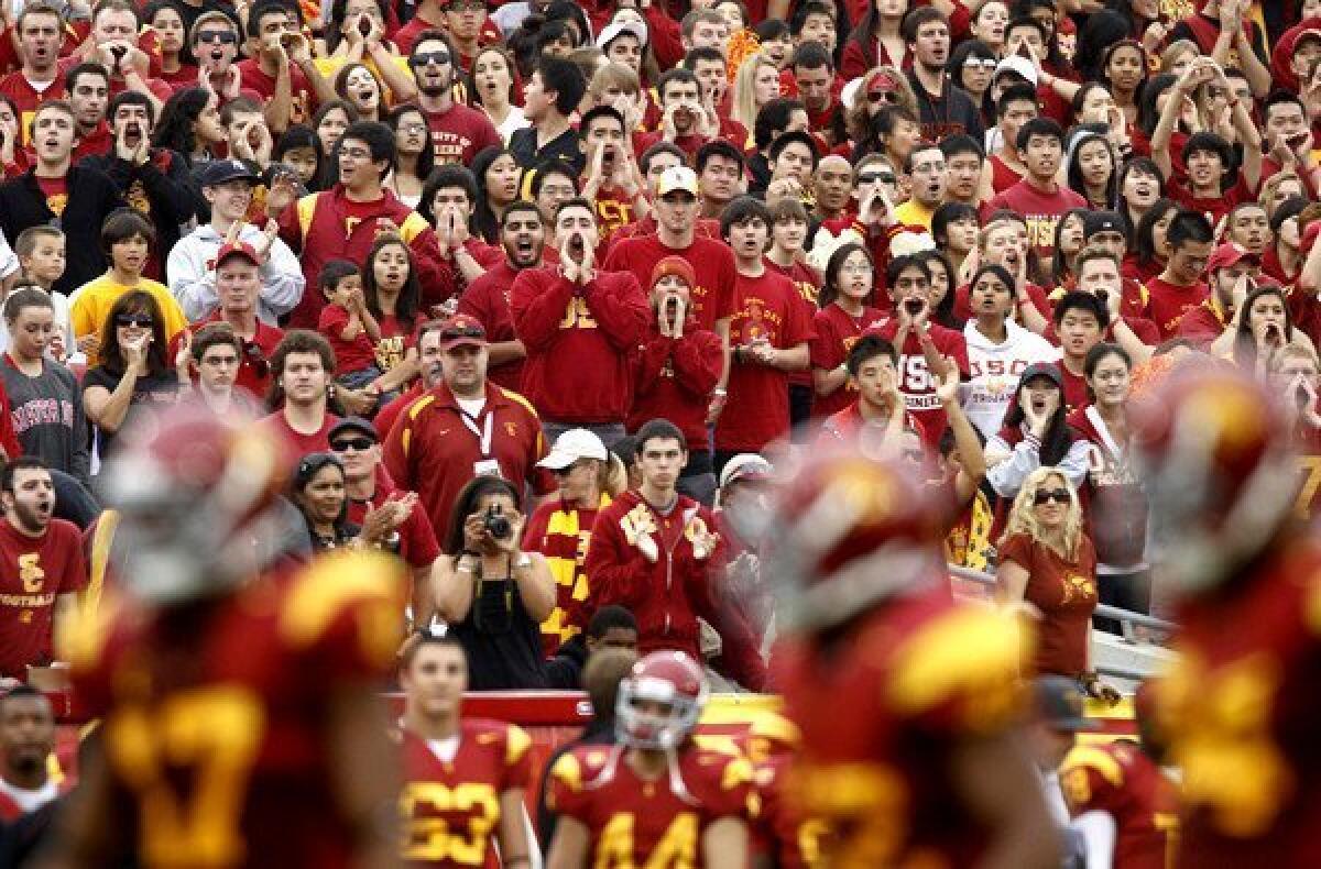 Fans cheer for USC during a game against California at the Coliseum in 2010, the only year in which the Trojans did not play in front of a capacity crowd.
