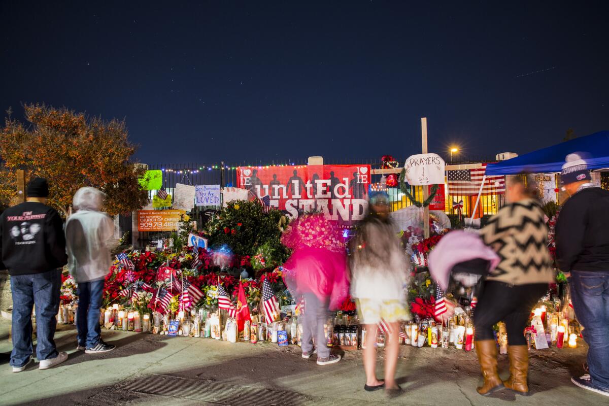A memorial site at the corner of Waterman Avenue and Orange Show Road, blocks from the Inland Regional Center, where 14 people were killed and another 21 wounded during the Dec. 2 terrorist attack by Syed Rizwan Farook and his wife, Tashfeen Malik.
