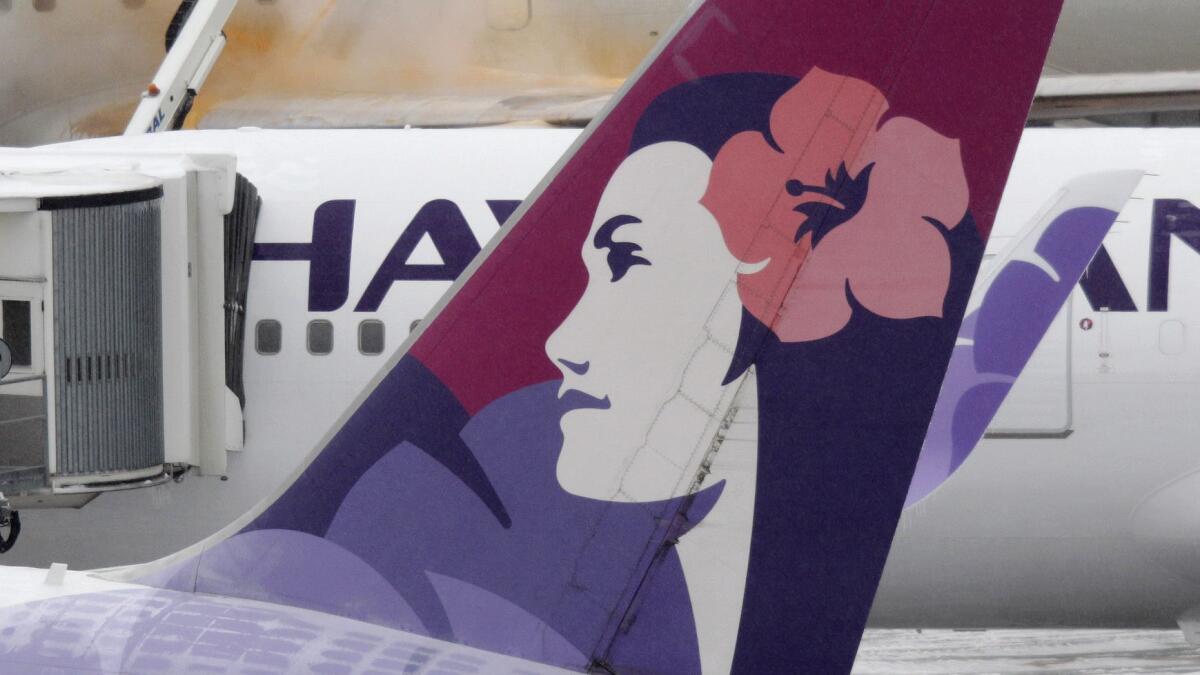 A Hawaiian Airlines flight out of L.A. returned multiple times because of unrelated systems issues, although the airline did not say what the specific problems were.