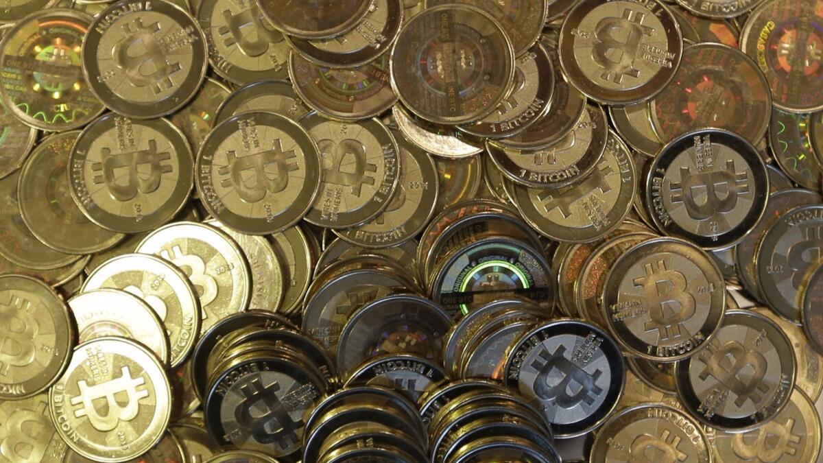 These bitcoin "tokens" are no more real than the cryptocurrency itself, which has been selling for more than $10,000 per "coin."