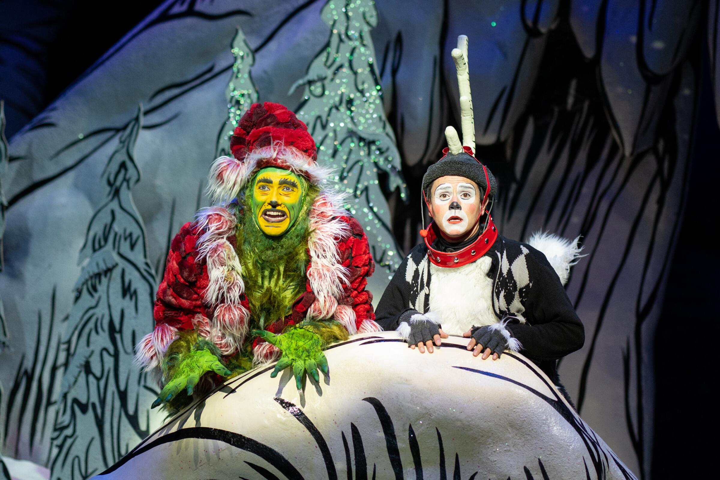 The Grinch and Young Maxi in the Old Globe's "Dr. Seuss's How the Grinch Stole Christmas!" in 2021.