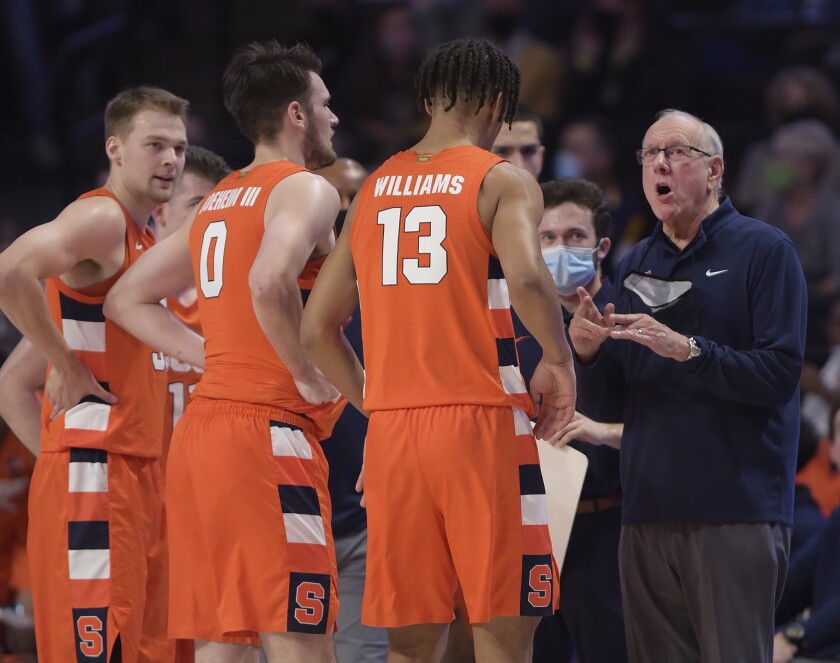 Syracuse head coach Jim Boeheim talks with his team during a time out as the Orange fall to Wake Forest, 77-74 OT in NCAA college basketball game, Saturday, Jan. 8, 2022 at Joel Coliseum in Winston-Salem, N.C. (Walt Unks/The Winston-Salem Journal via AP)