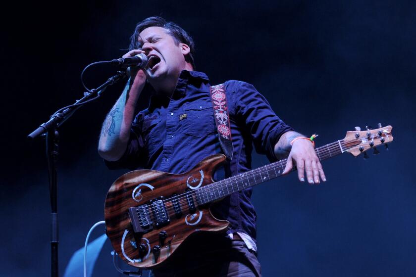 Isaac Brock of Modest Mouse performs during Day One of the 2013 Coachella Valley Music and Arts Festival at the Empire Polo Club pm Friday in Indio.