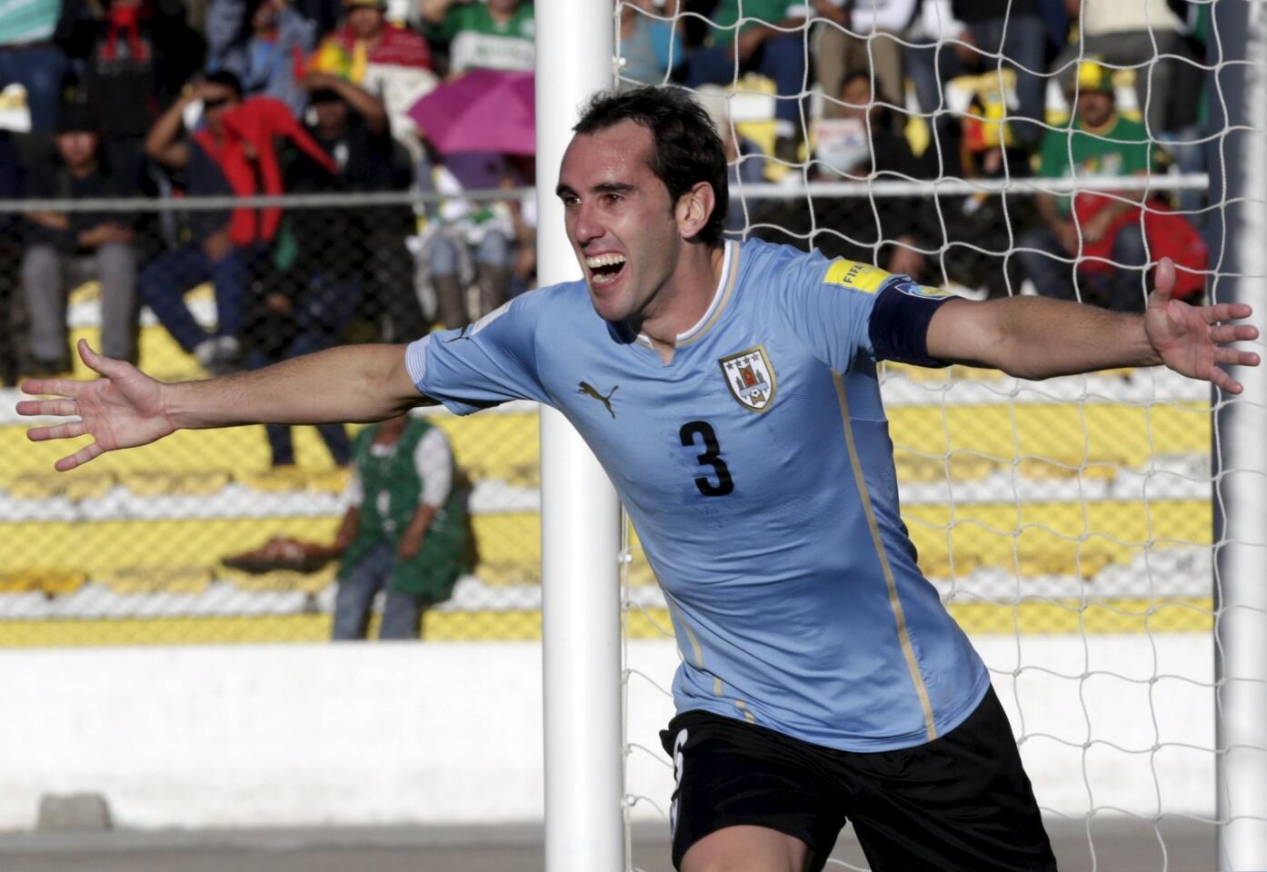 Diego Godin of Uruguay celebrates after scoring against Bolivia during their 2018 World Cup qualifying soccer match in La Paz