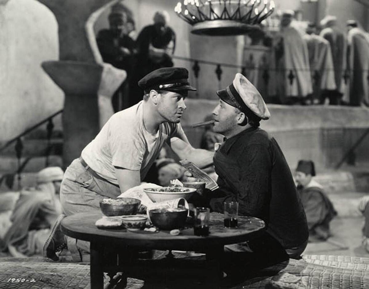 Bob Hope, left, and Bing Crosby in a scene from the 1940 Hollywood film "The Road to Singapore."