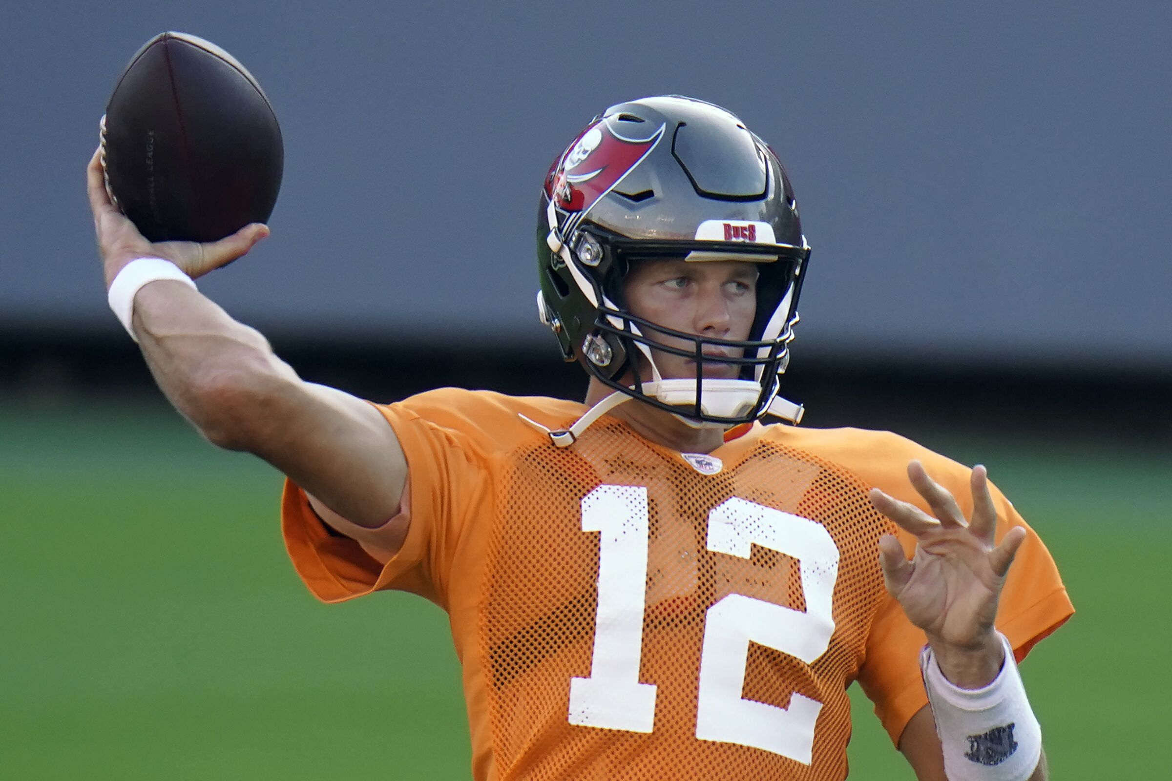 Tampa Bay Buccaneers quarterback Tom Brady throws a pass during practice in August.