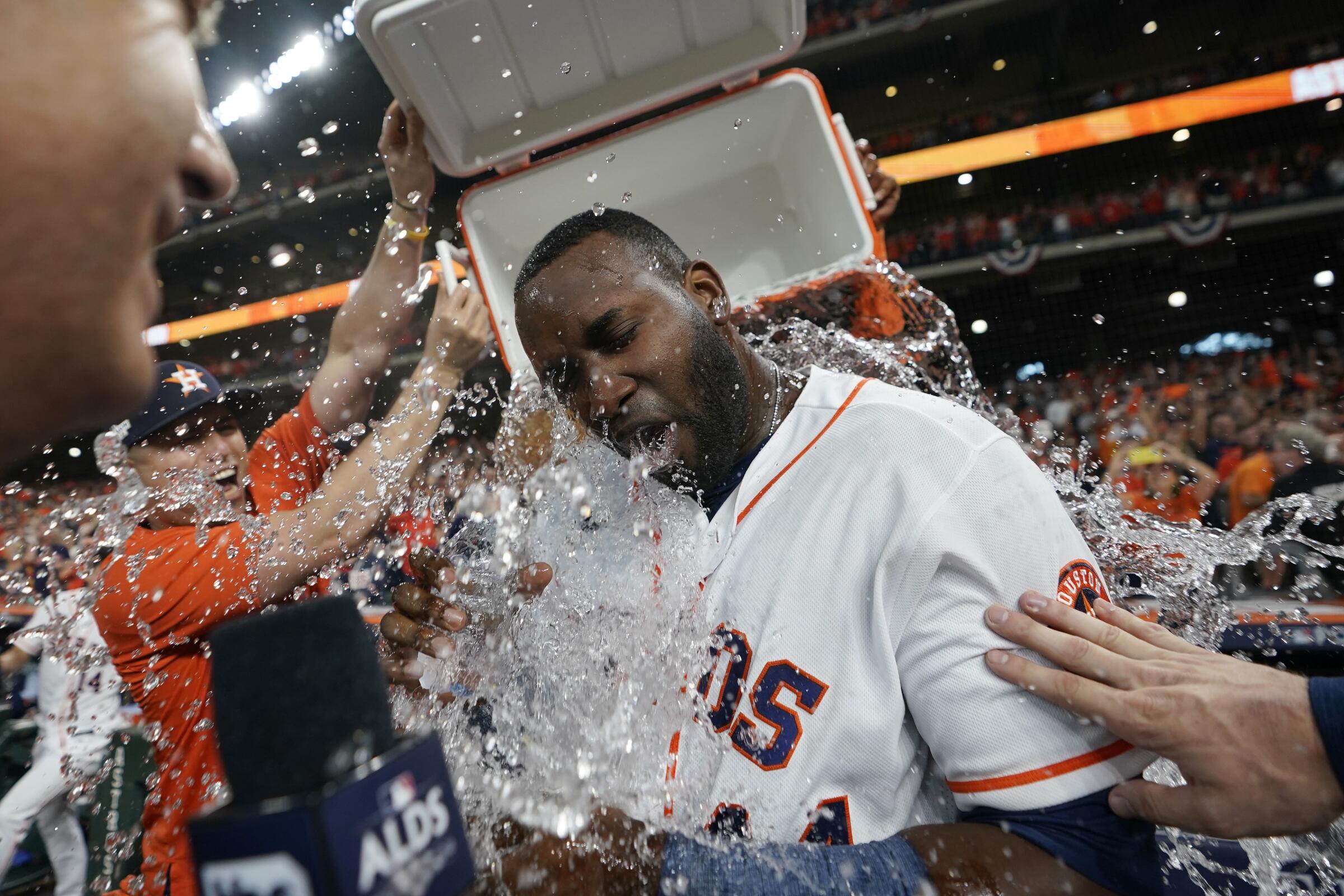 Houston Astros designated hitter Yordan Alvarez (44) celebrates after hitting a three-run, walkoff home run.