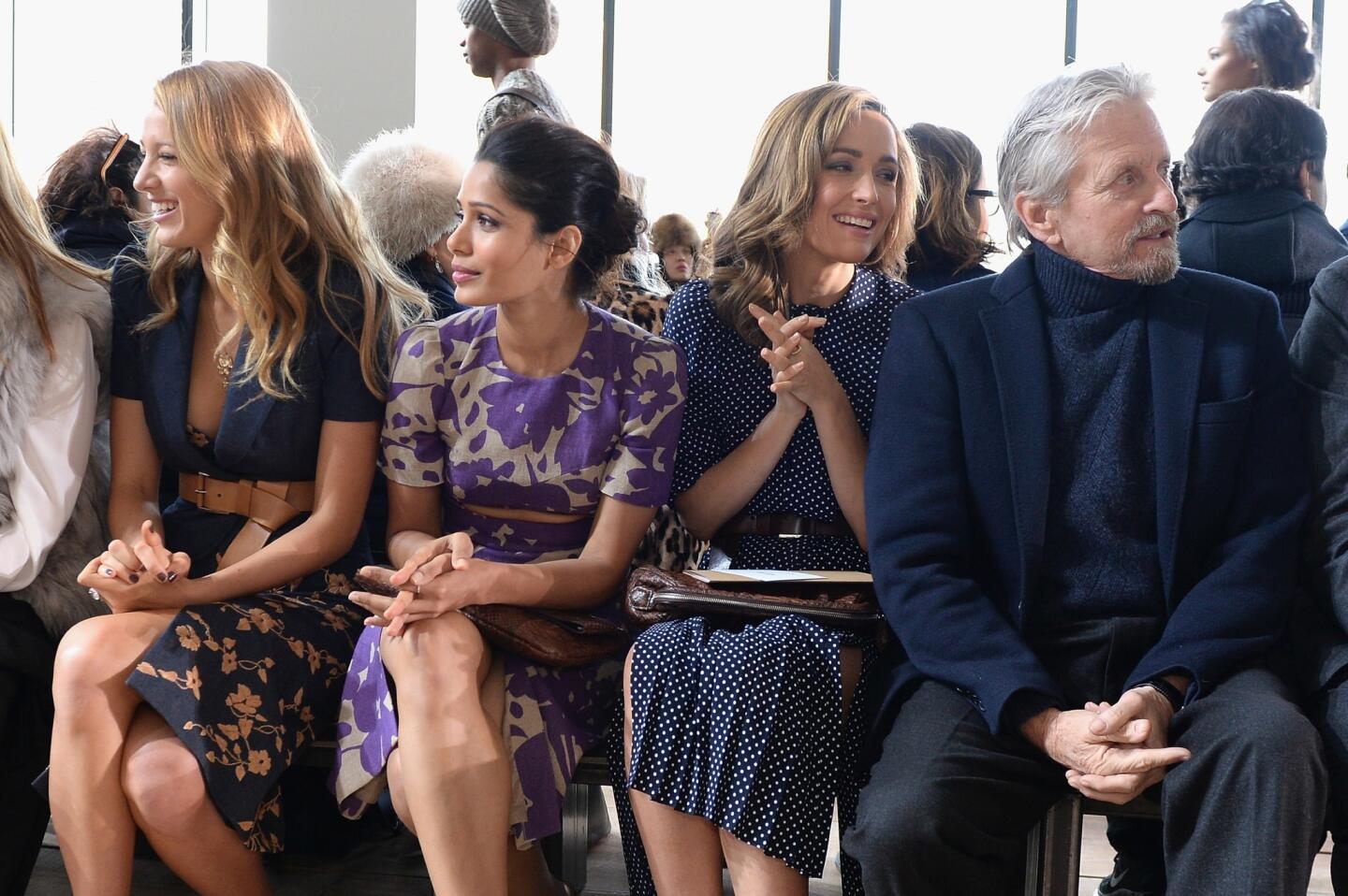 Blake Lively, Freida Pinto, Rose Bryne and Michael Douglas attend the Michael Kors fashion show.