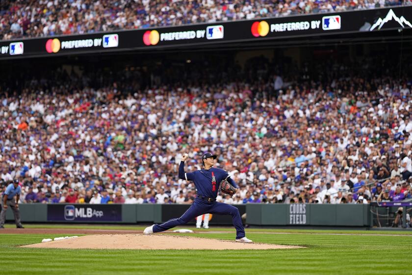 American League's starting pitcher Shohei Ohtani, of the Angels, throws during the MLB All-Star baseball game