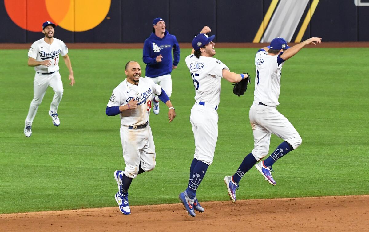 Dodgers players celebrate winning the World Series over the Tampa Bay Rays on Oct. 27, 2020.