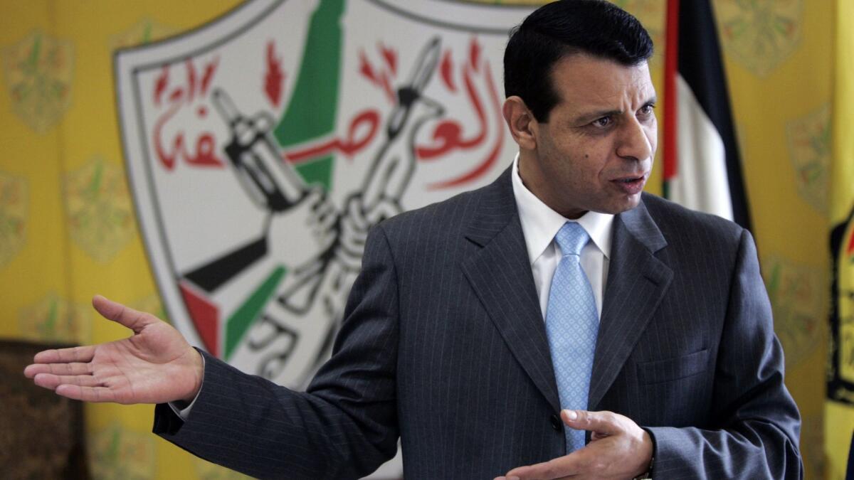 Palestinian Fatah leader Mohammed Dahlan gestures as he speaks during an interview on Jan. 3, 2011, in the West Bank city of Ramallah.
