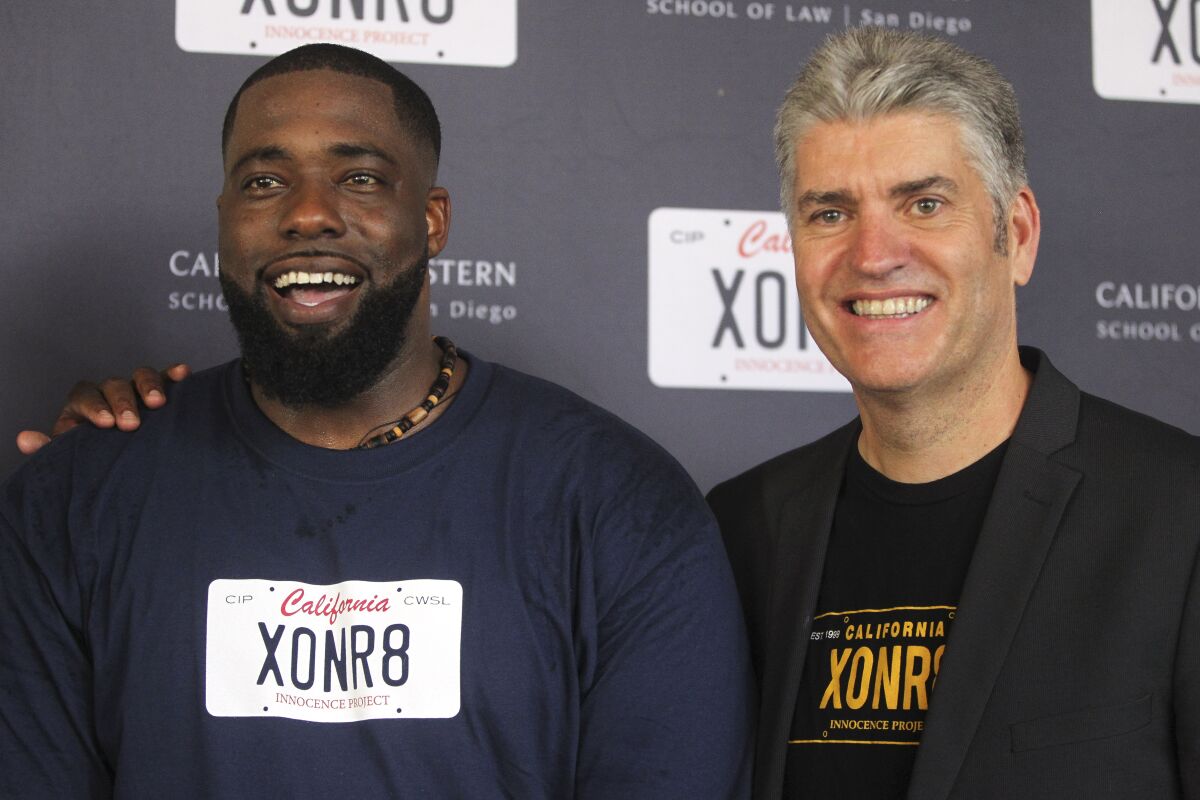 Brain Banks, left, stands with Justin Brooks during the red carpet premier for "Brian Banks", hosted by the California Innocence Project, at the Museum of Photographic Arts in Balboa Park on Saturday, August 3, 2019 in San Diego, California.