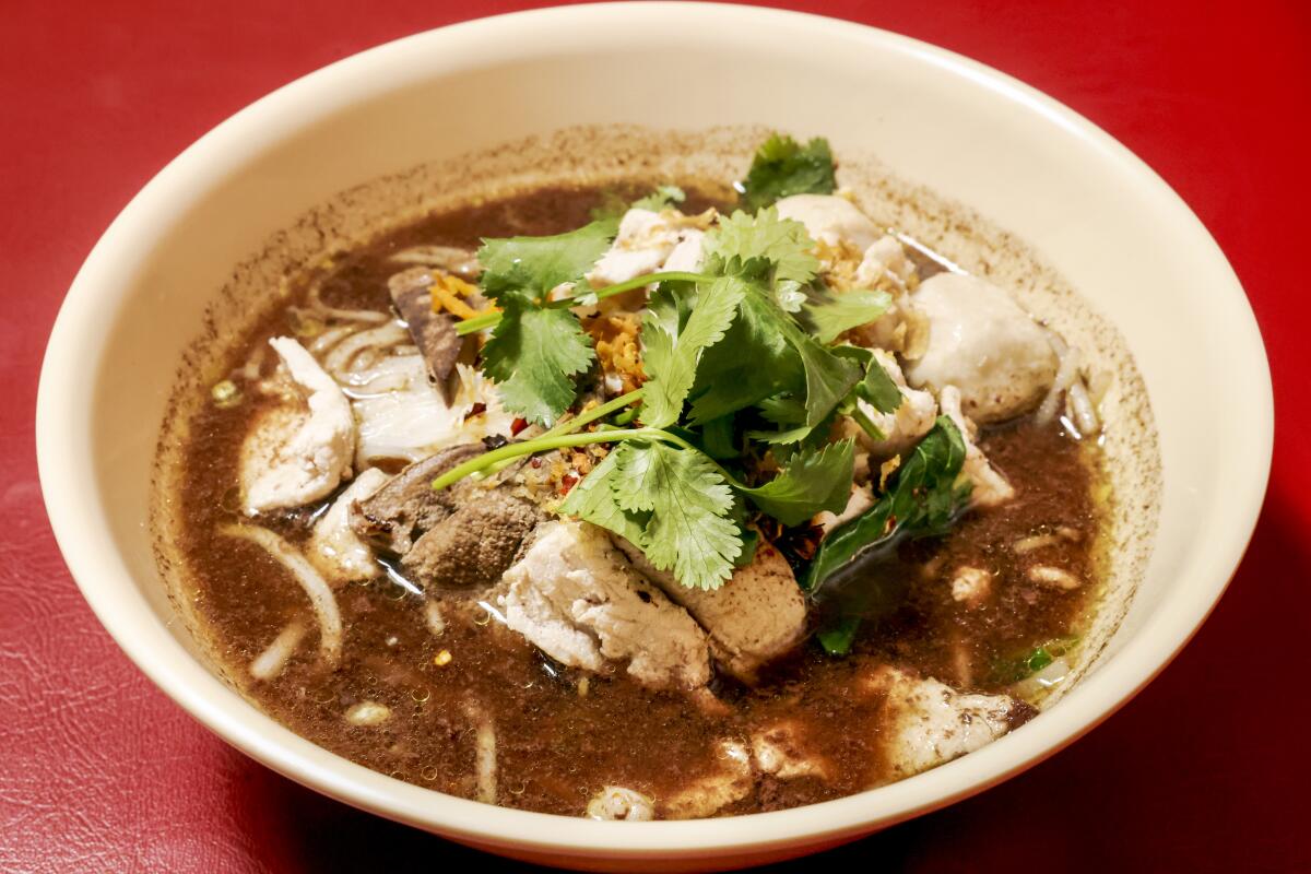 Thai Boat Noodle soup with pork broth and white rice noodles from Pa Ord.