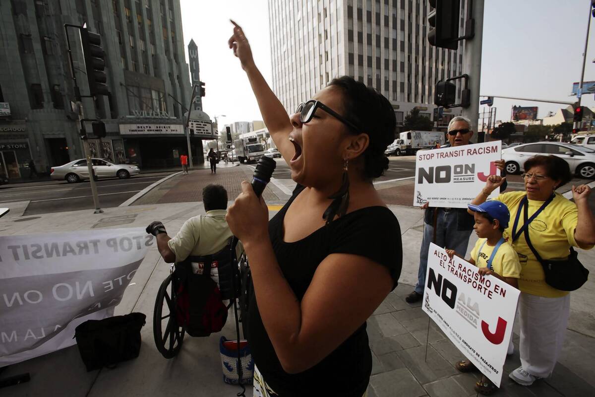 Carla Gonzalez chants during a demonstration against Measure J in Los Angeles.