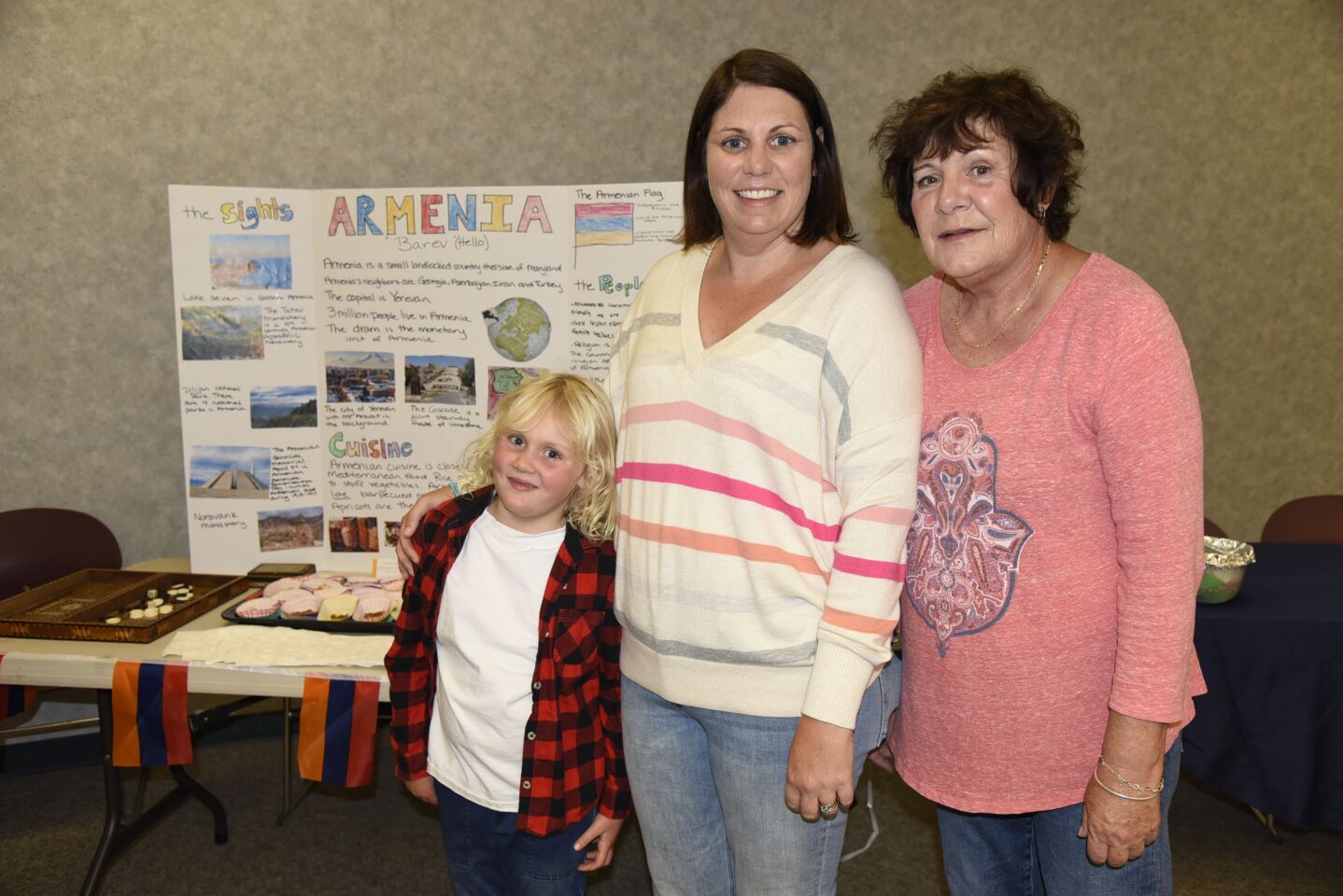 Representing Armenia is event co-chair Brittany Pambakian, with Poppy and Julie Braatz
