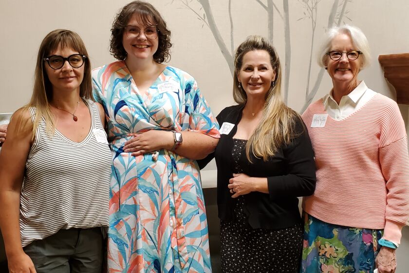 Student Carly Bethune, Holly Boyce, Patricia Welling and La Jolla Garden Club scholarship chairwoman Mary Yoder.
