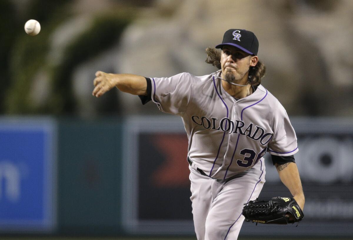 Colorado Rockies relief pitcher Christian Bergman throws against the Los Angeles Angels during the fifth inning of a baseball game, Wednesday, May 13, 2015, in Anaheim, Calif.