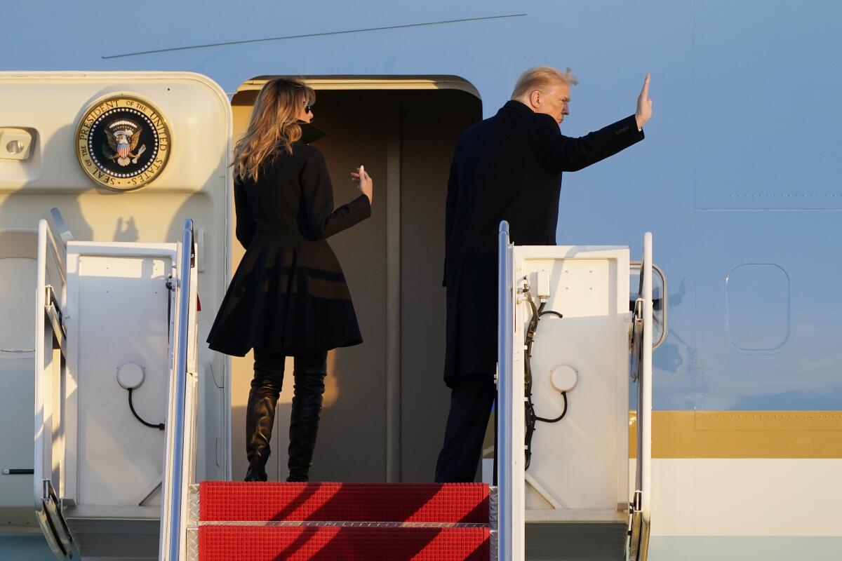 President Trump and first lady Melania Trump board Air Force One on Dec. 23.