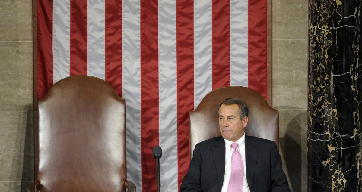 House Speaker John Boehner of Ohio waits for the start of a Joint Session of Congress in the House Chamber on Capitol Hill to count the Electoral College votes.