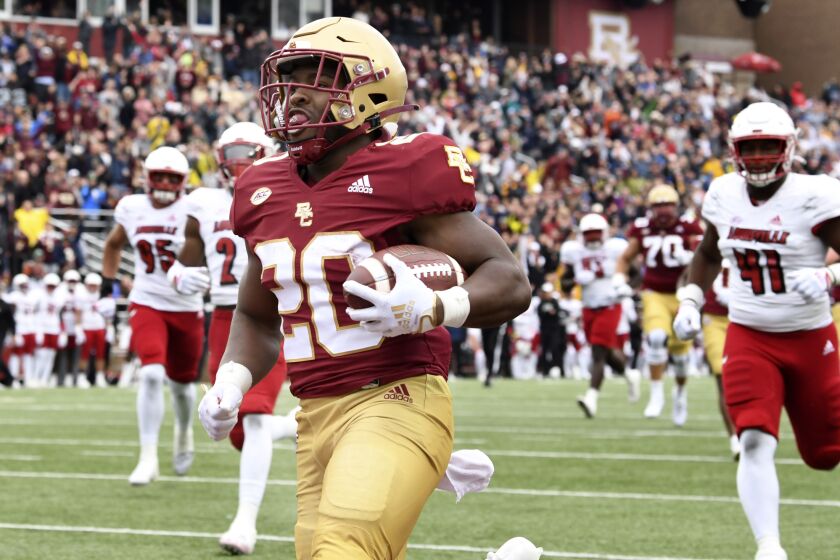 Boston College running back Alex Broome runs into the endzone to score against Louisville during the first half of an NCAA college football game Saturday, Oct. 1, 2022, in Boston. (AP Photo/Mark Stockwell)