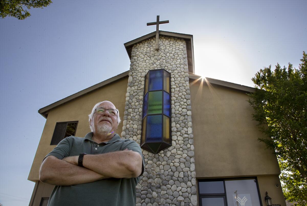 Pastor Glen Haworth of the Fount stands in front of the church on June 22.