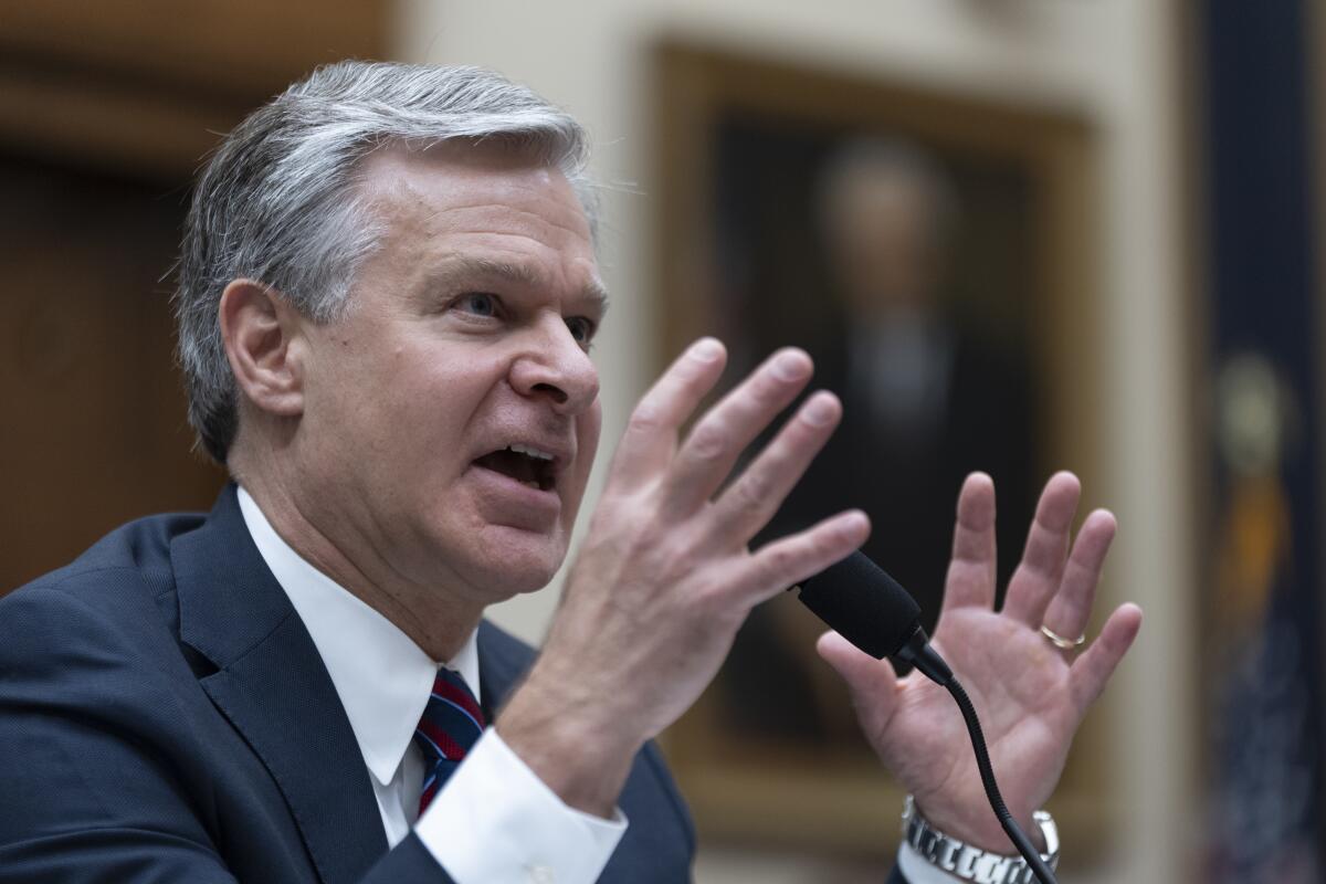 FBI Director Christopher Wray testifies before a House committee