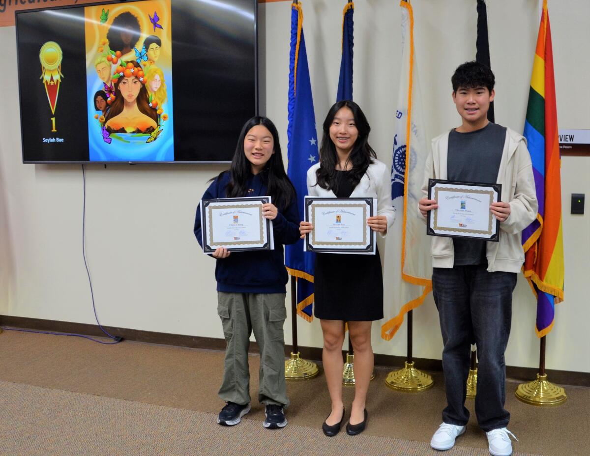 Winners of the OC Fair & Event Center Youth Diversity Art competition, from left, Claire Chong, Seylah Bae and Vincent Pham.