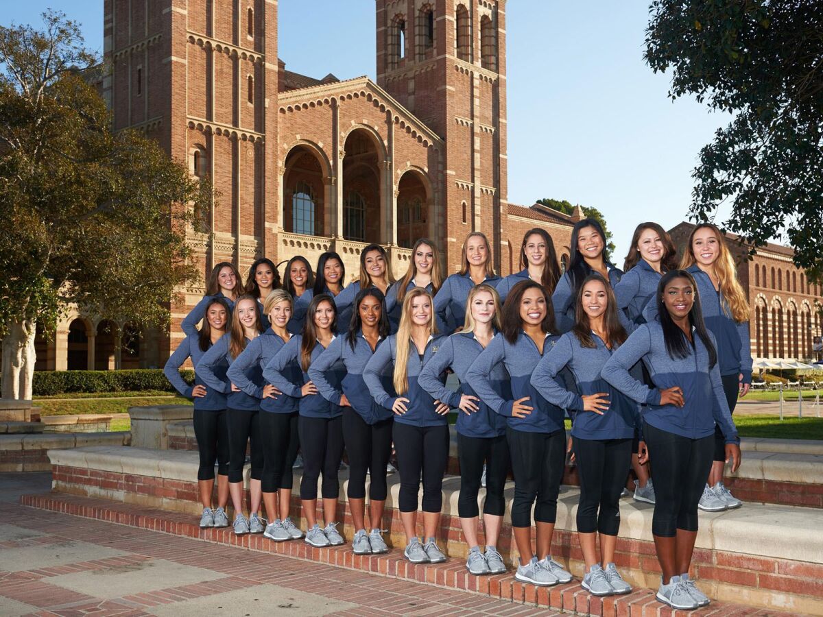 Maria Caire is at top left in this portrait of the 2017 UCLA gymnastics team.