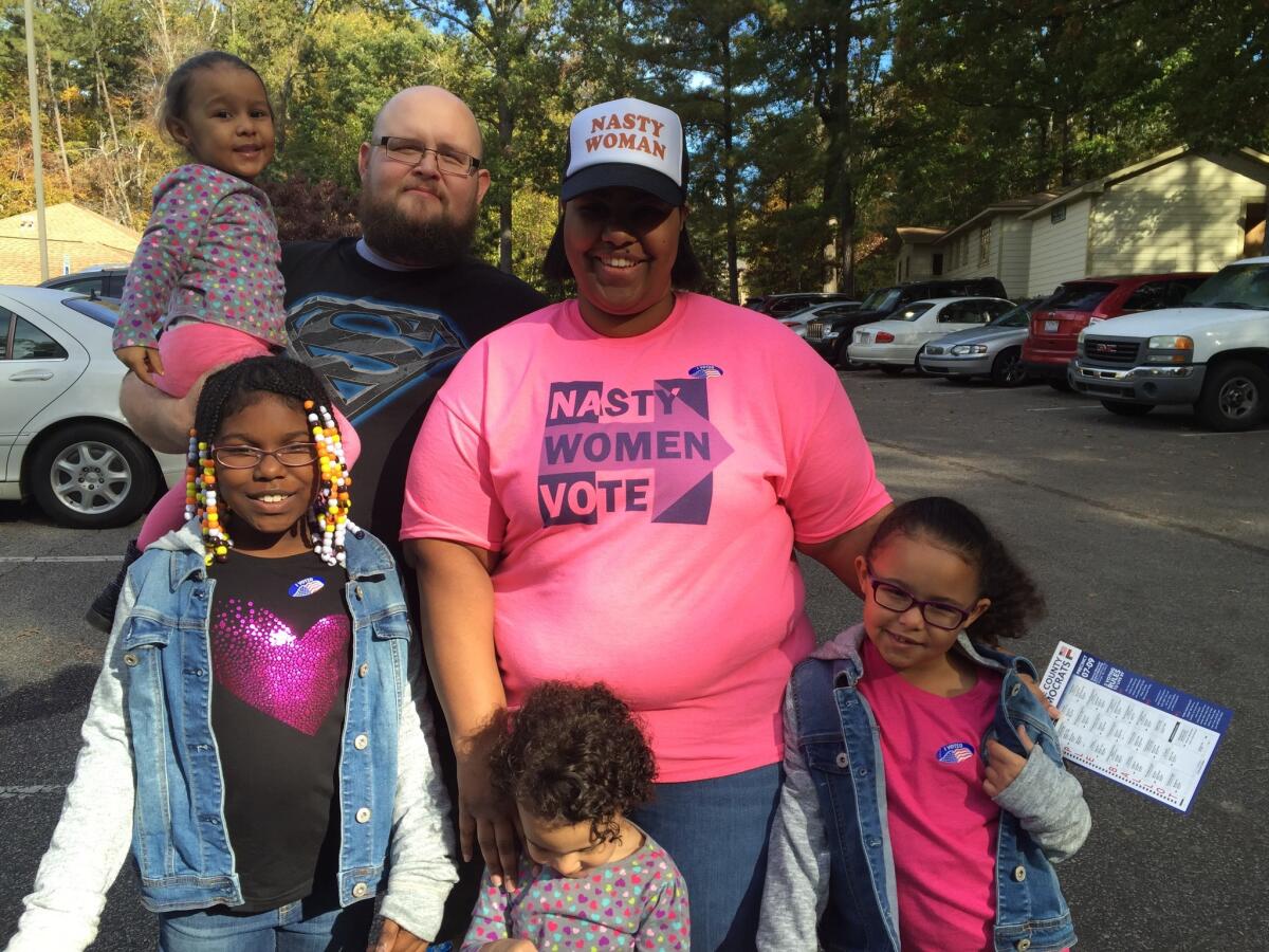 Geisha and Nicholas Brooks, with their daughters, voted for Hillary Clinton on Tuesday in Raleigh.