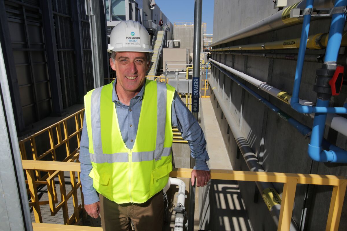 Peter MacLaggan, recently retired senior vice president of Poseidon Water, stands at the Carlsbad desalination plant.