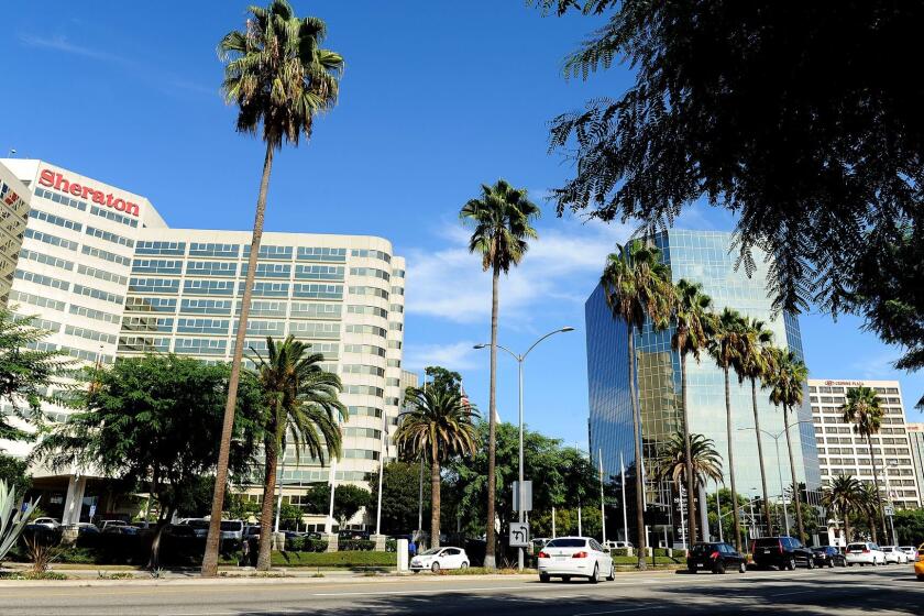 Century Boulevard near Los Angeles International Airport is crowded with hotels, most of which are owned, licensed or managed by mega-hotel companies.