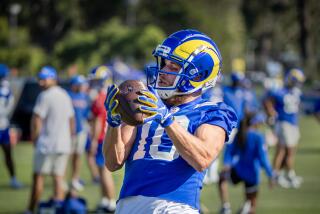 Irvine, CA - July 27: Rams wide receiver Cooper Kupp hauls in a pass.