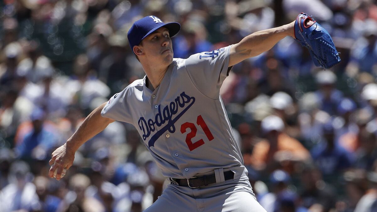 Dodgers starter Walker Buehler delivers a pitch during the first inning against the San Francisco Giants on June 9.