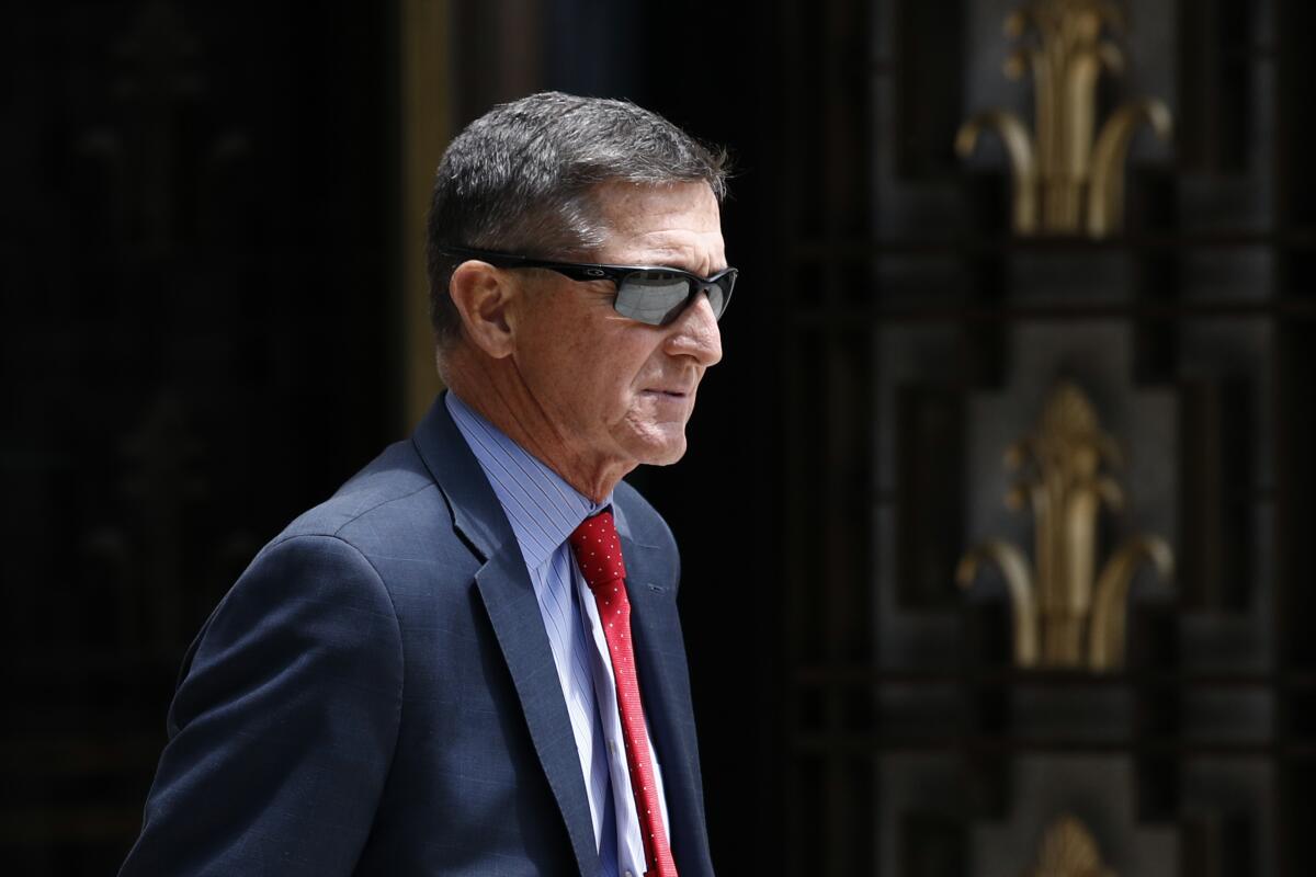 Michael Flynn, President Trump's first national security advisor, leaves the federal courthouse in Washington after a hearing last year.