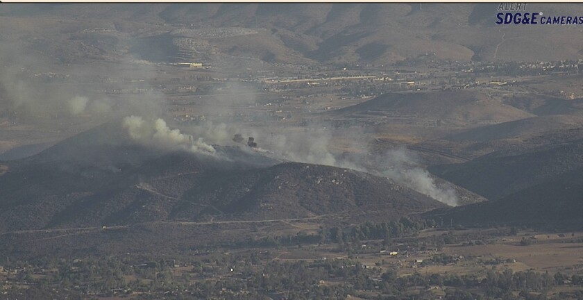 A brush fire near Dulzura is seen on a camera.