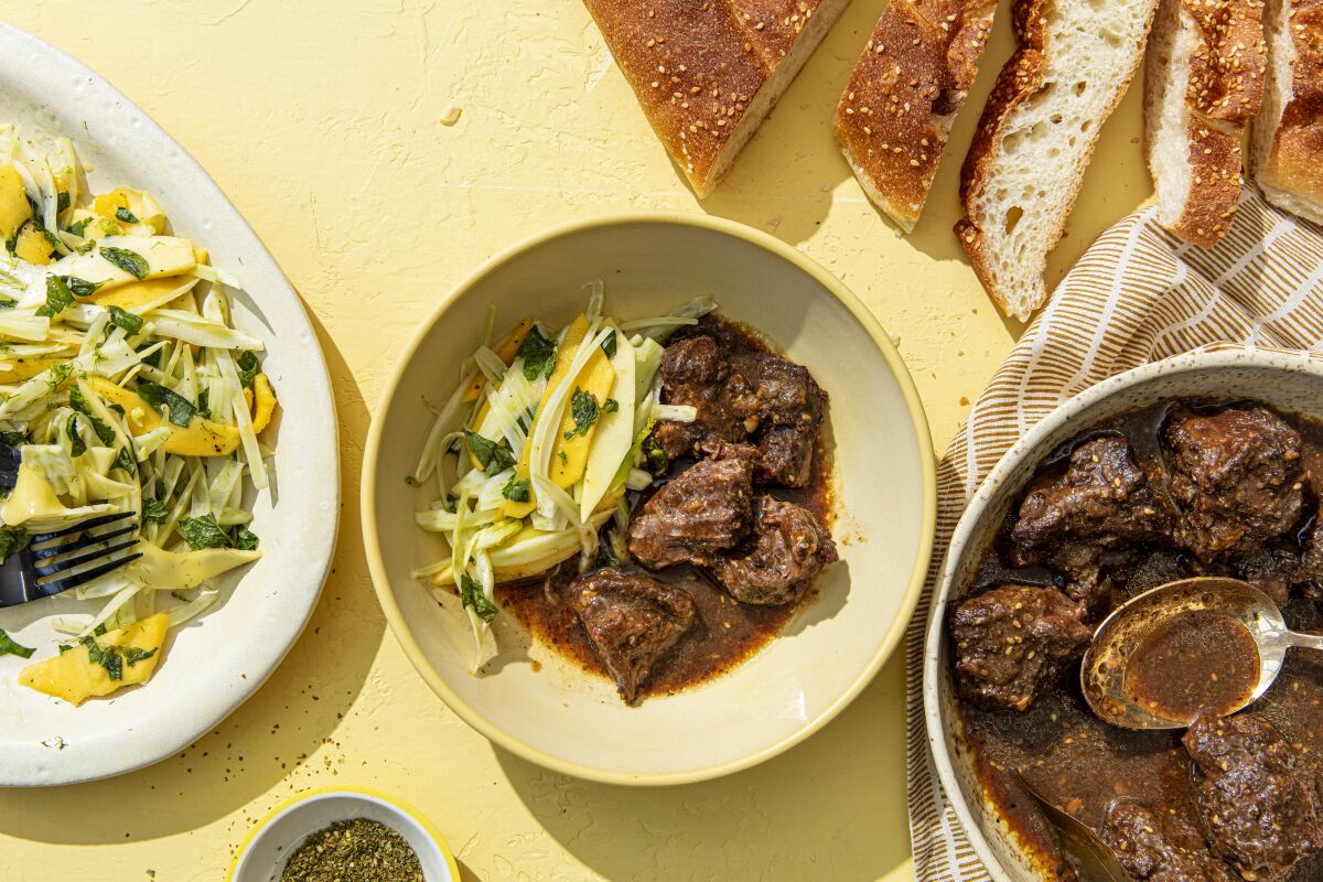 Zaatar beef chicken with mango and fennel salad