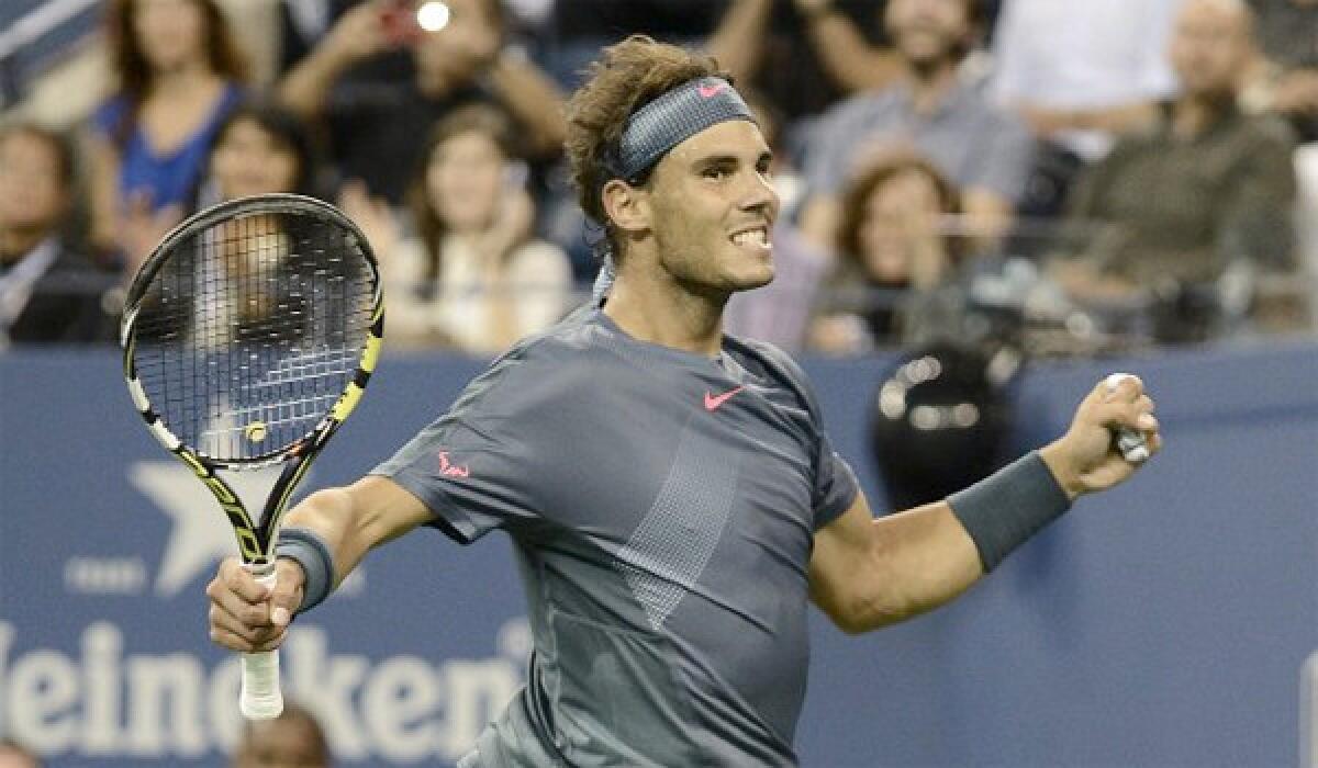 Rafael Nadal reacts after defeating Tommy Robredo during a quarterfinals match at the U.S. Open, 6-0, 6-2, 6-2.