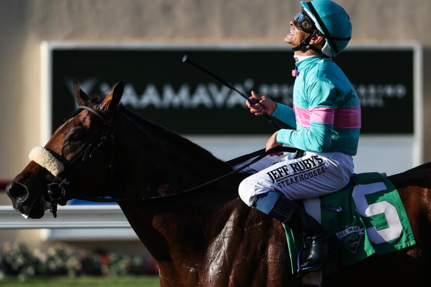 Del Mar, CA - July 21: Jockey Mike Smith celebrates after winning the ninth race during Opening Day at the Del Mar Thoroughbred Club on Friday, July 21, 2023 in Del Mar, CA. (Meg McLaughlin / The San Diego Union-Tribune)