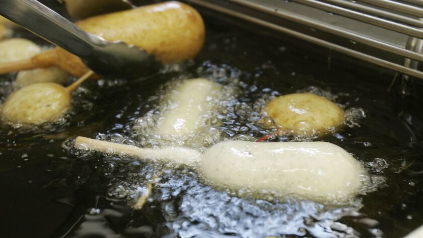 Milky Way candy bars are deep-fried in oil free of trans fats at the Indiana State Fair. The World Health Organization has called on all nations to eliminate artificial trans fats from foods in the next five years.