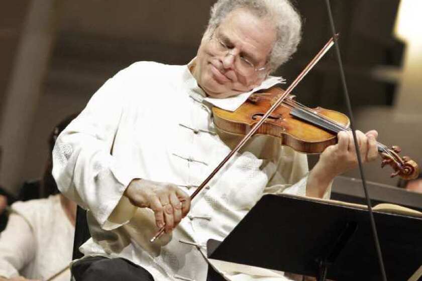 Violinist Itzhak Perlman performing with the Los Angeles Philharmonic earlier this month at the Hollywood Bowl.