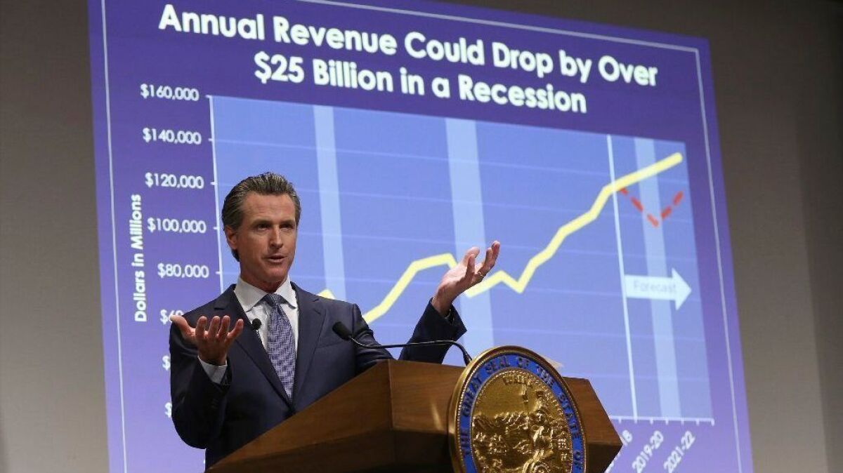 Gov. Gavin Newsom presents his first state budget during a news conference in Sacramento on Jan. 10.