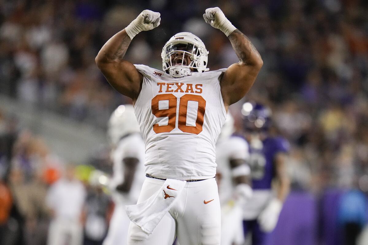 Texas defensive lineman Byron Murphy II reacts after collecting a sack against Texas Christian.