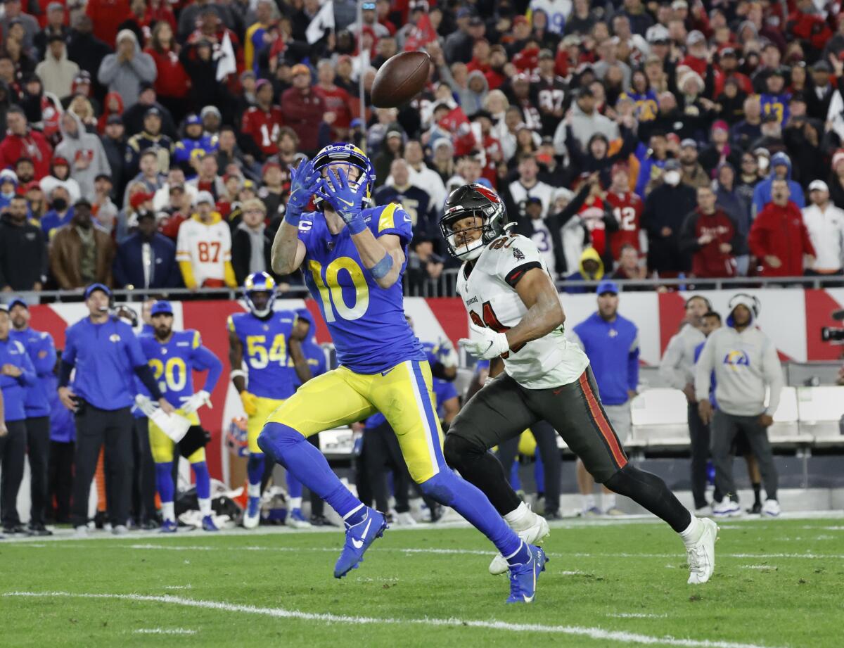 Rams receiver Cooper Kupp hauls in a 44-yard catch past Buccaneers safety Antoine Winfield Jr.